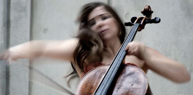Alisa Weilerstein in motion playing the cello